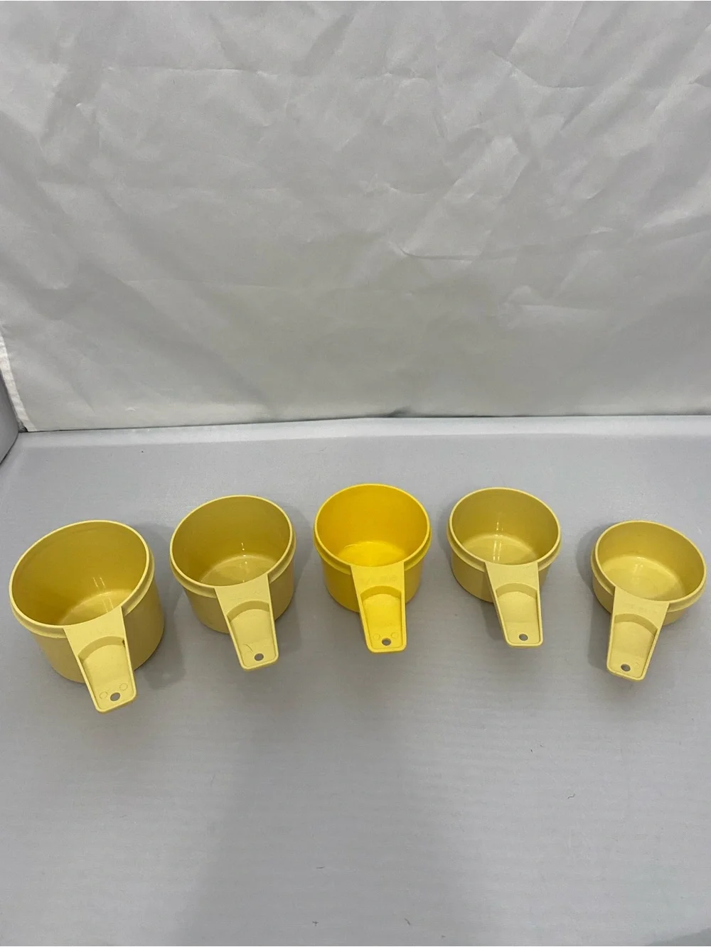 Yellow Plastic Measuring Cups